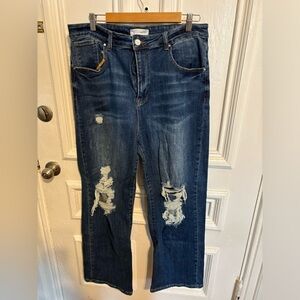 Risen jeans. Bootcut with distressing. Size 2XL